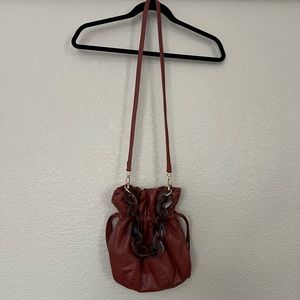 Shuviluna purse with playful tortoise handle.